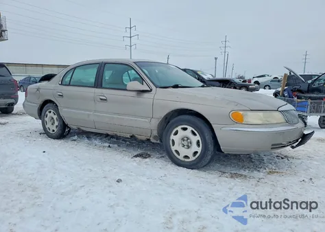 2000 Lincoln Continental z USA, uszkodzony, nr VIN 1LNHM97V7YY801563